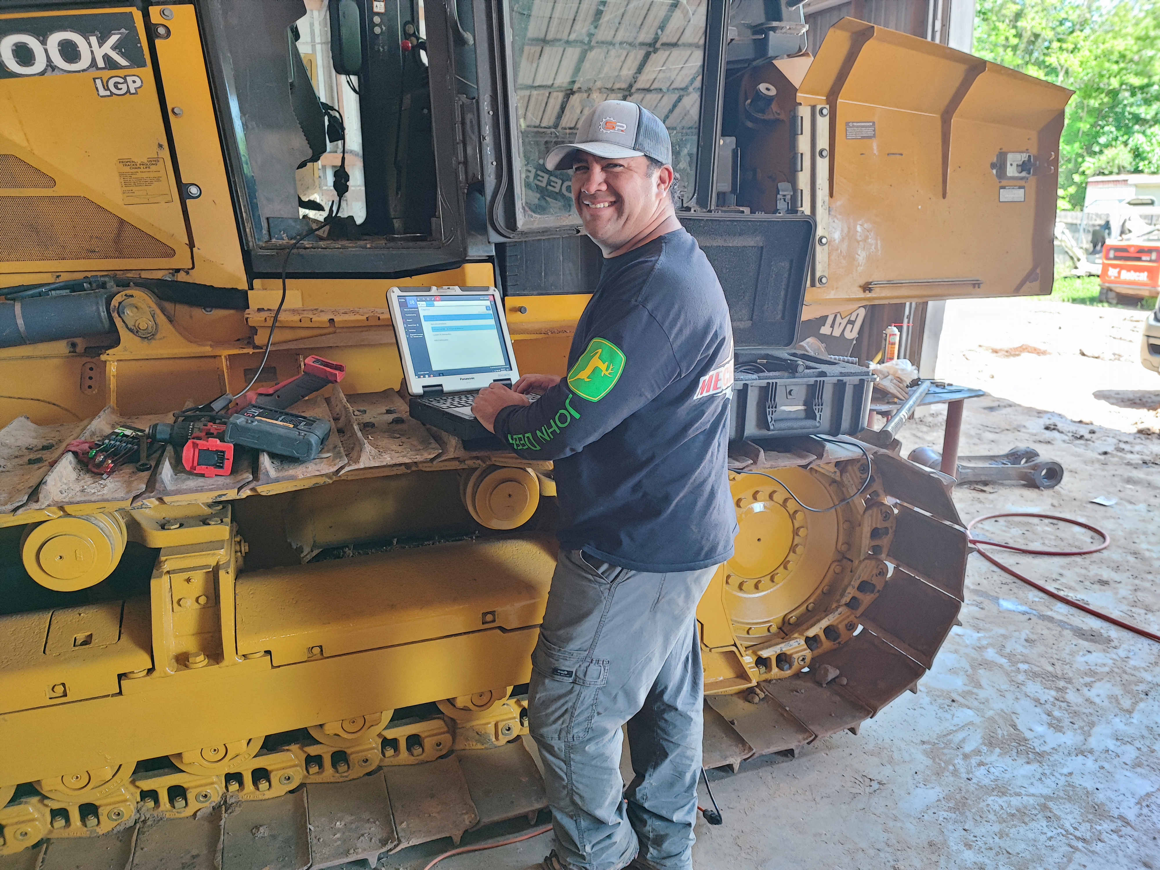Luis Vera - INMAVE HTX diagnostic specialist working on Cat bulldozer with Panasonic Toughbook